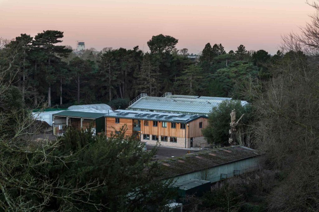 Arboretum HQ building among trees at Kew Gardens
